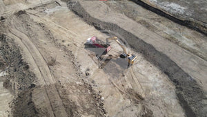 Excavator Dumping In Truck
